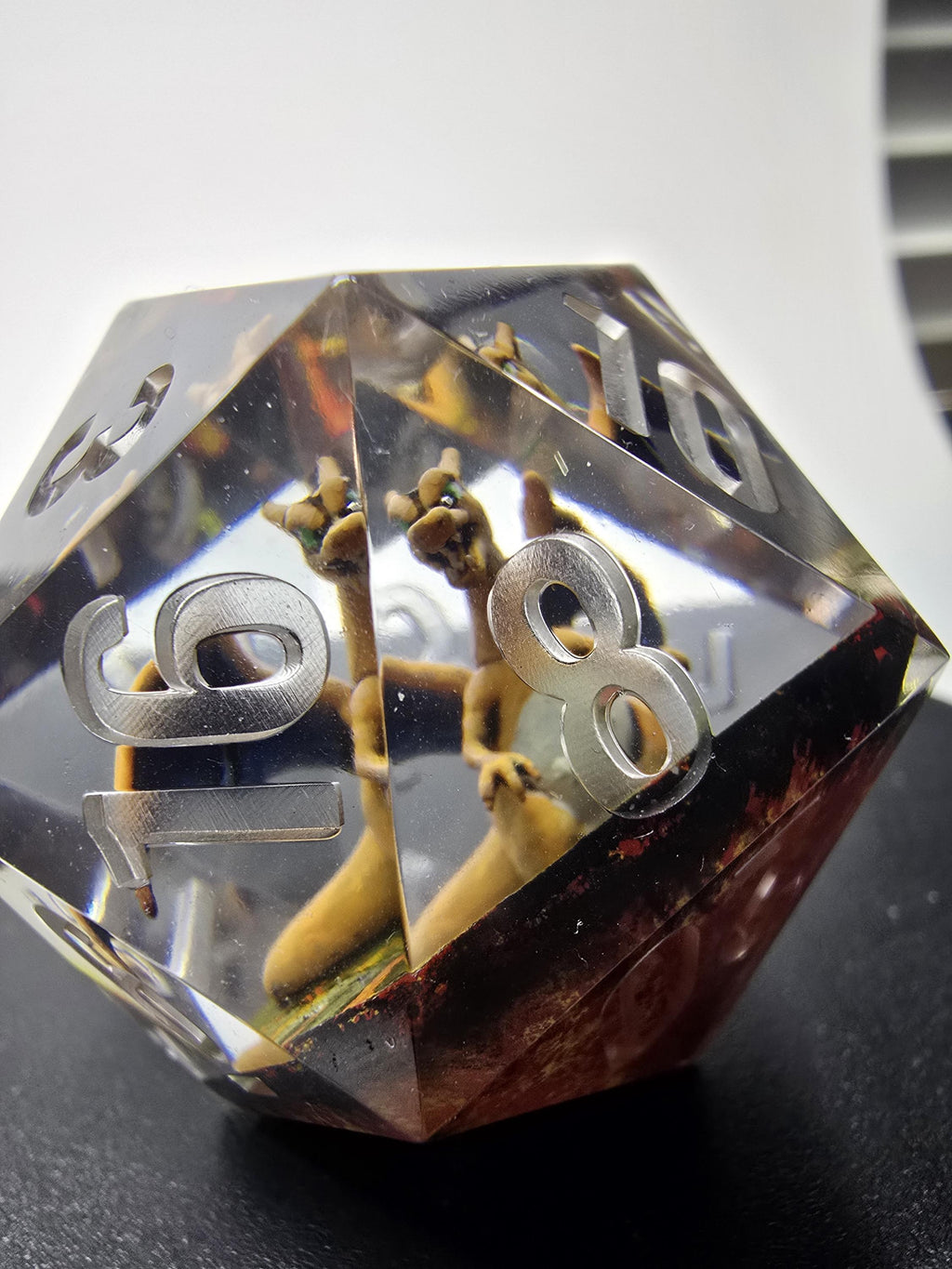 Charizard,s Revolution. This is a Large 42mm hand painted inclusion Chonk D20.