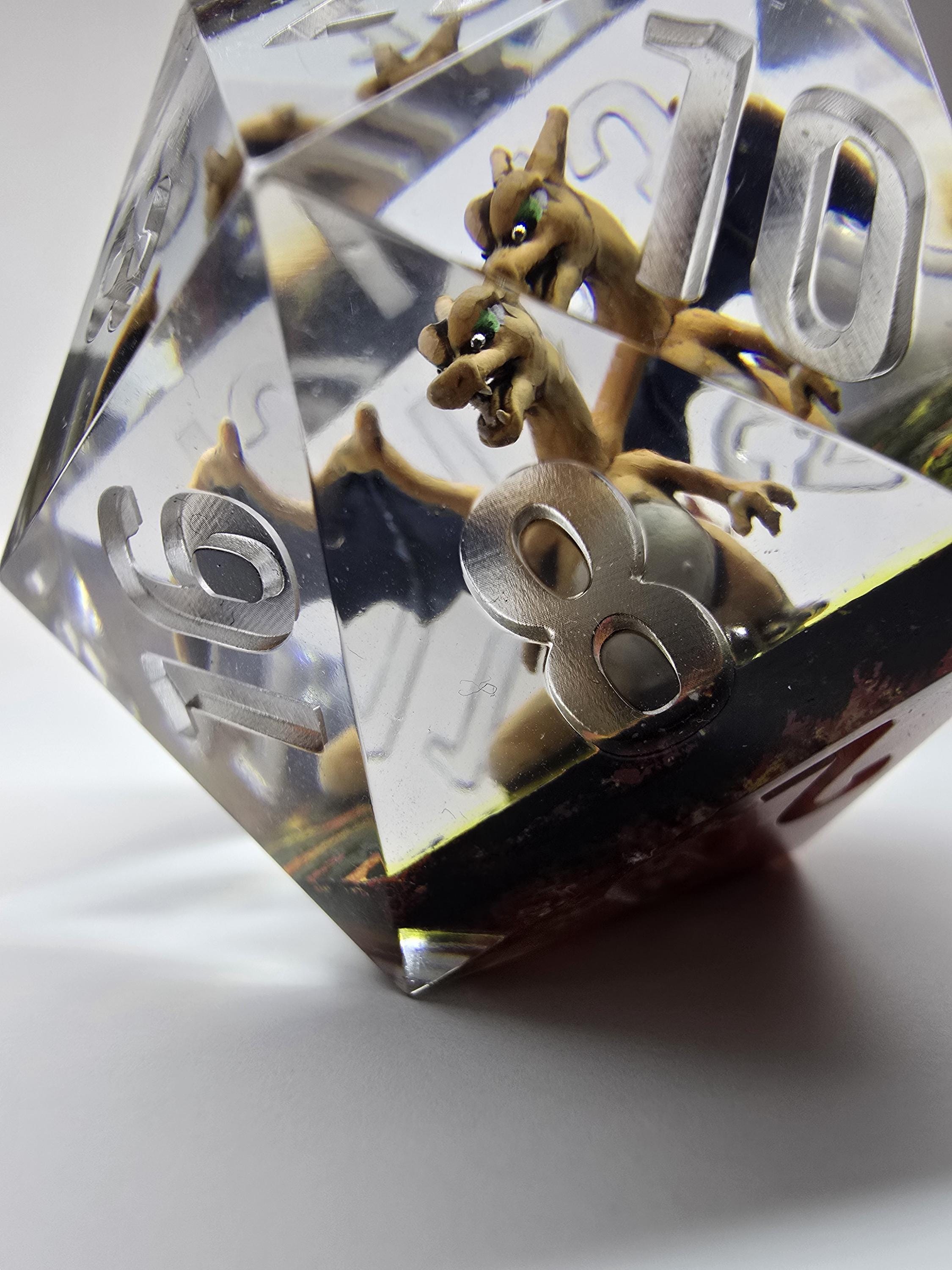 Charizard,s Revolution. This is a Large 42mm hand painted inclusion Chonk D20.