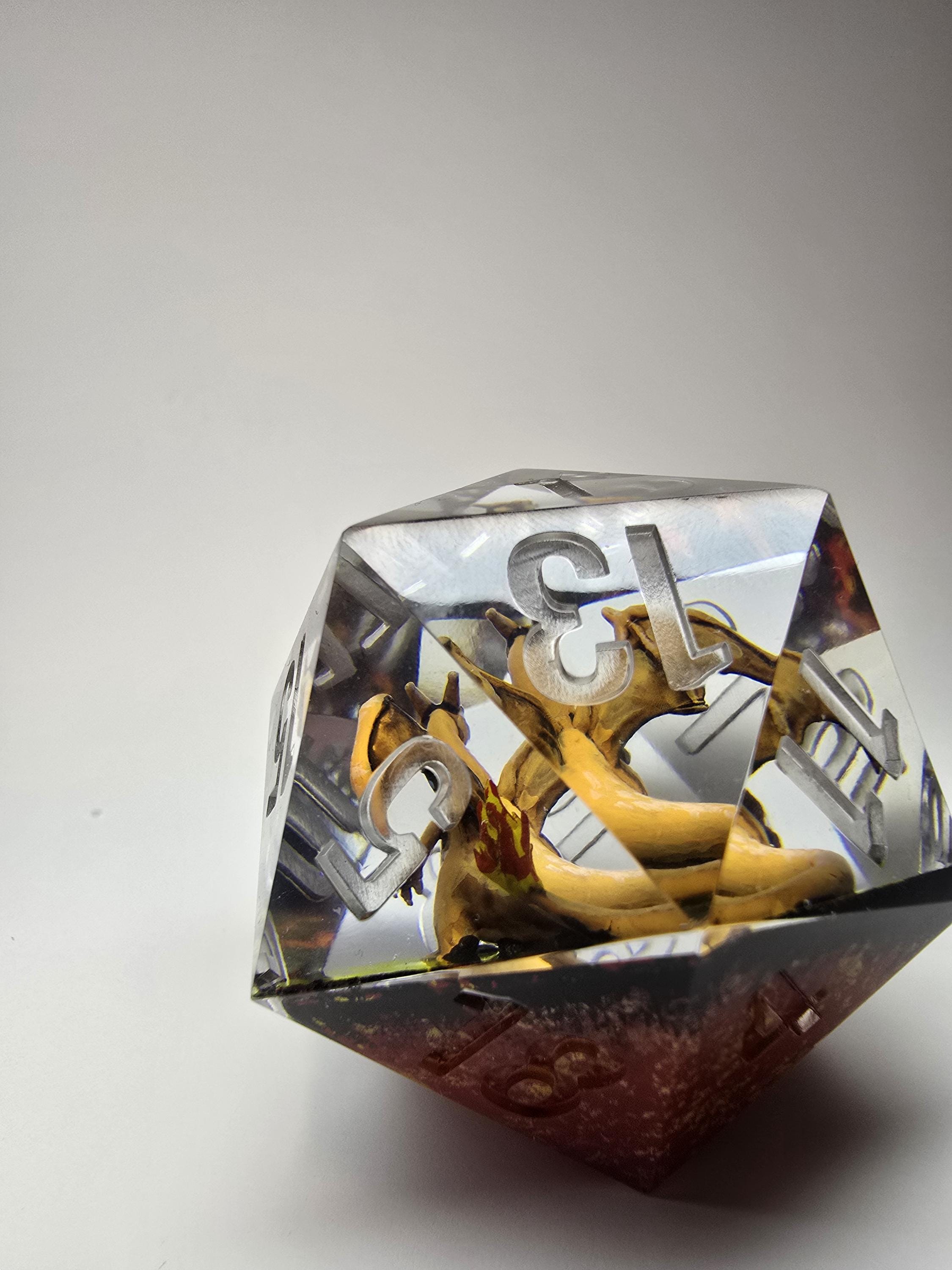 Charizard,s Revolution. This is a Large 42mm hand painted inclusion Chonk D20.