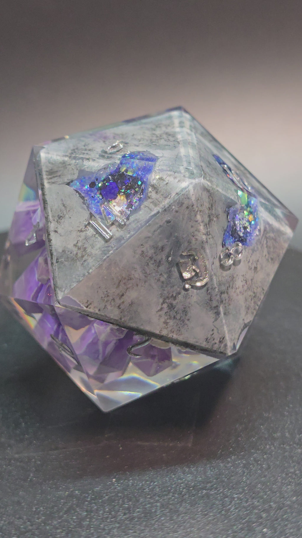 Amethyst Excellence. This is a Large 42mm hand painted inclusion Chonk D20.
