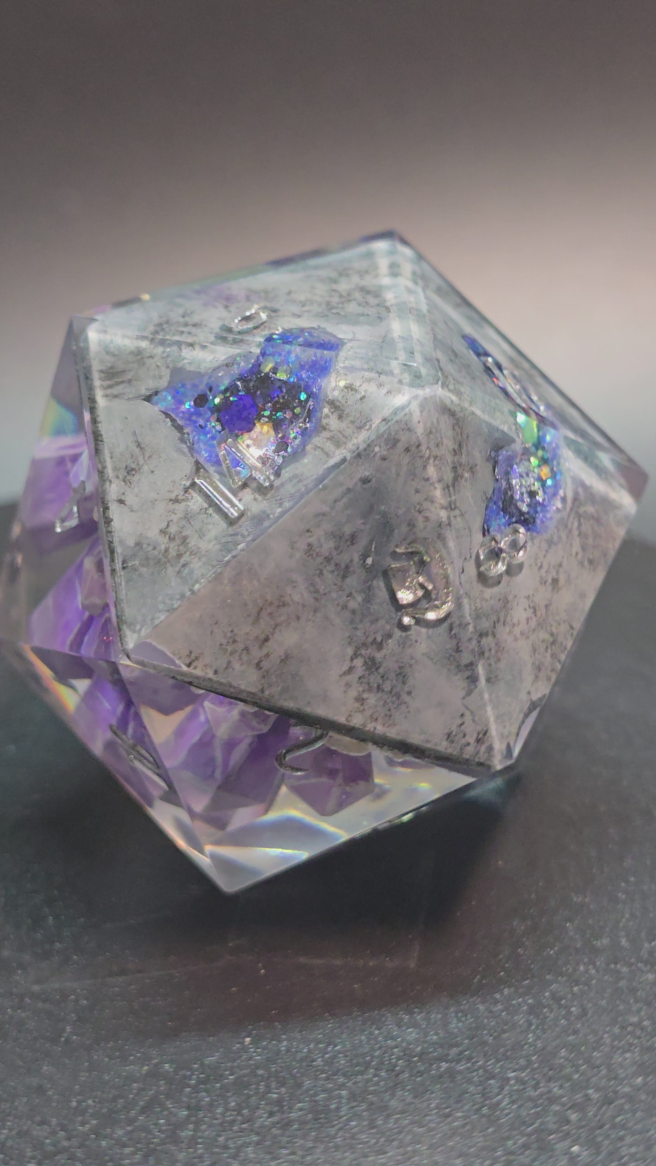 Amethyst Excellence. This is a Large 42mm hand painted inclusion Chonk D20.