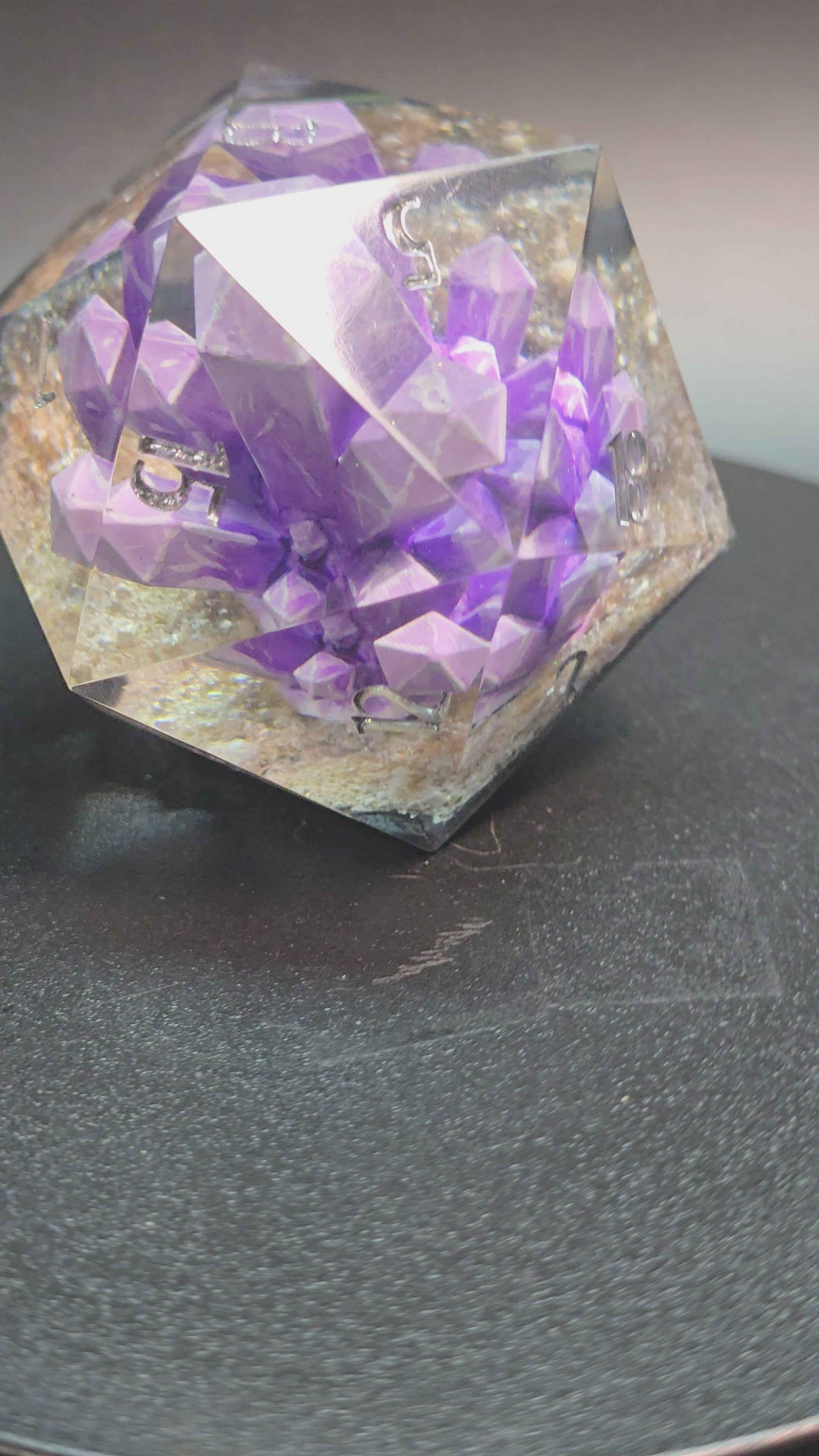Amethyst Excellence. This is a Large 42mm hand painted inclusion Chonk D20.