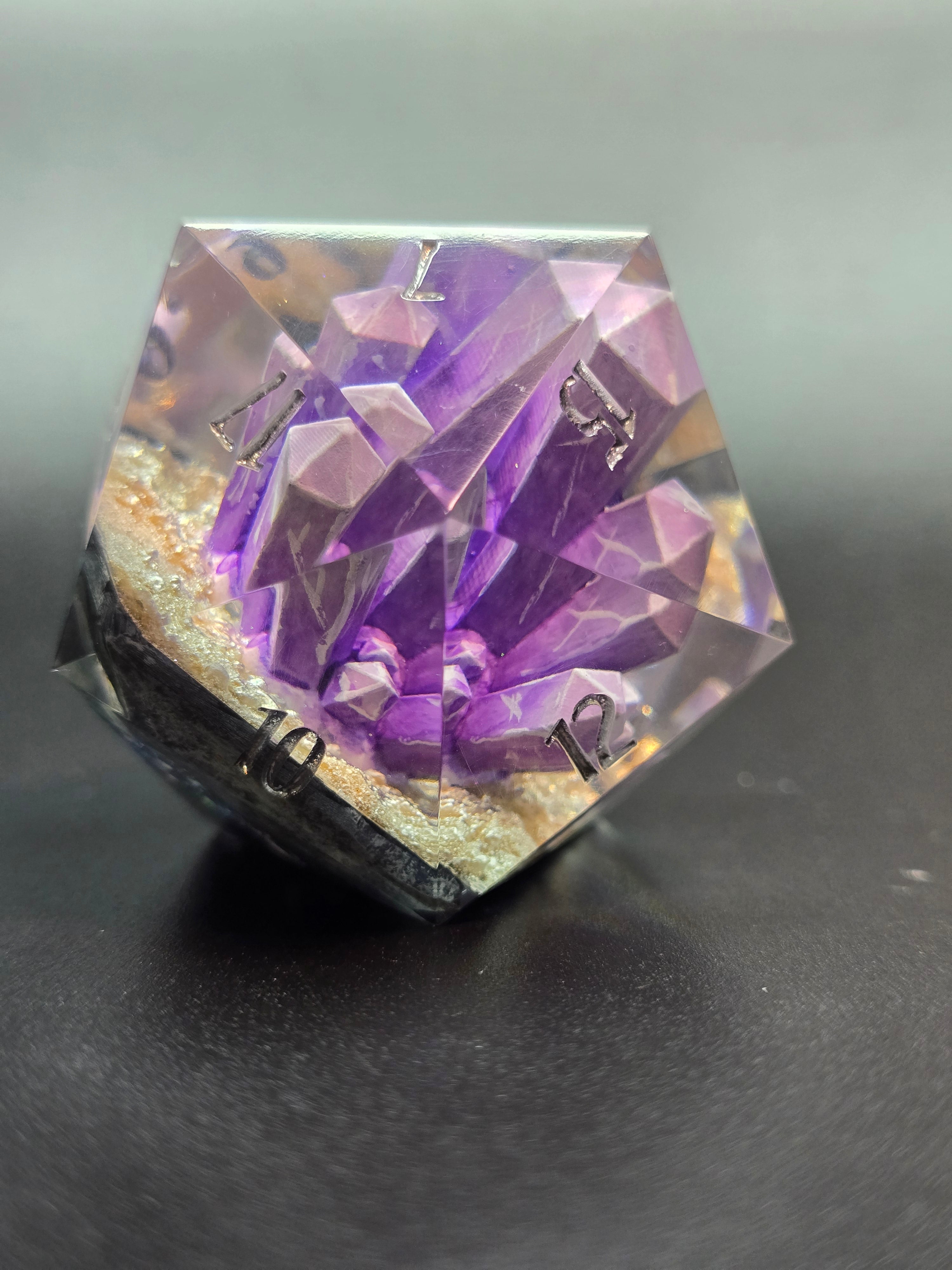 Amethyst Excellence. This is a Large 42mm hand painted inclusion Chonk D20.