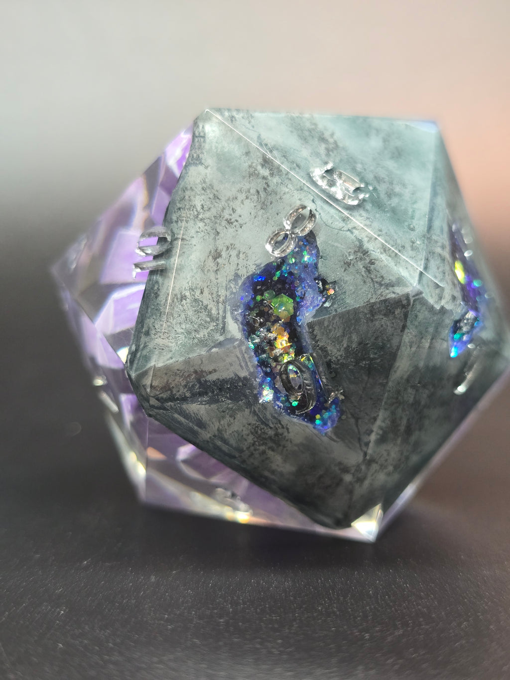Amethyst Excellence. This is a Large 42mm hand painted inclusion Chonk D20.